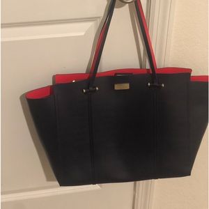 Kate spade navy purse with orange inside Beautiful hand bag great condition